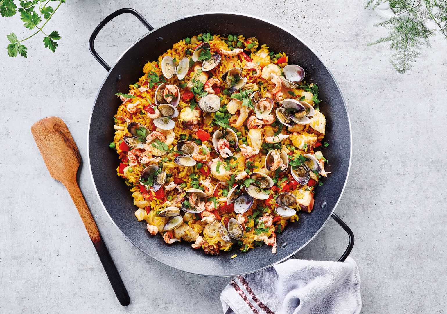Create a Spanish atmosphere in your home with our paella recipe